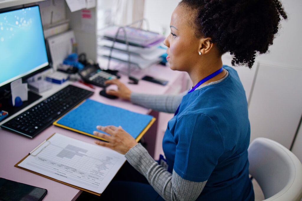 Black woman using computer to work